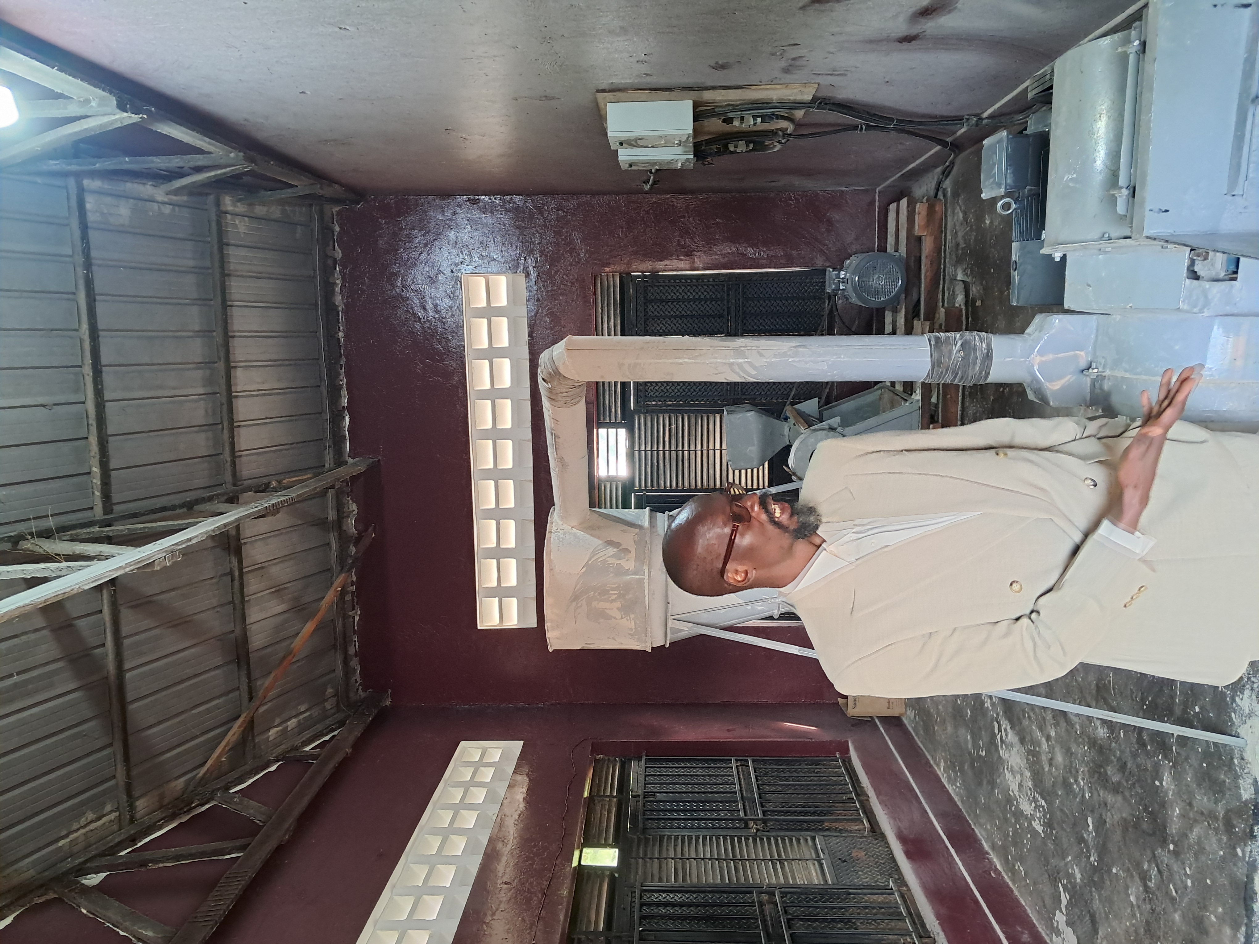 Inspection, monitoring and evaluation of the newly installed 50hp grinding and hauling mill by Chief Executive Director, Dr. Oling Dawn Kerjew in Myene, Kamdini Sub-county, Oyam District.